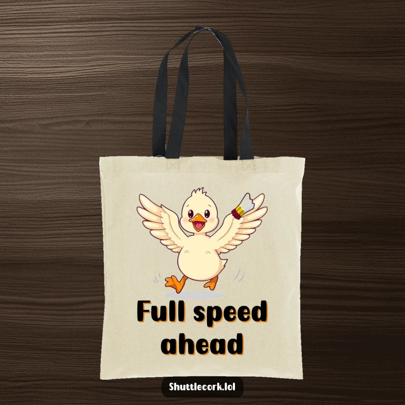 Funny tote bag print of an energetic duckling with wings spread wide, enthusiastically chasing a shuttlecock on a badminton court.